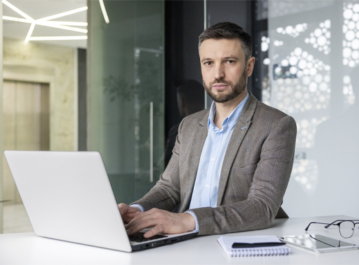 business-professional-working-intently-on-laptop