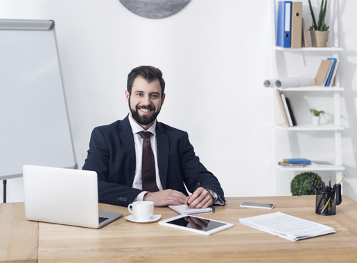 portrait-of-smiling-businessman-looking-at-camera